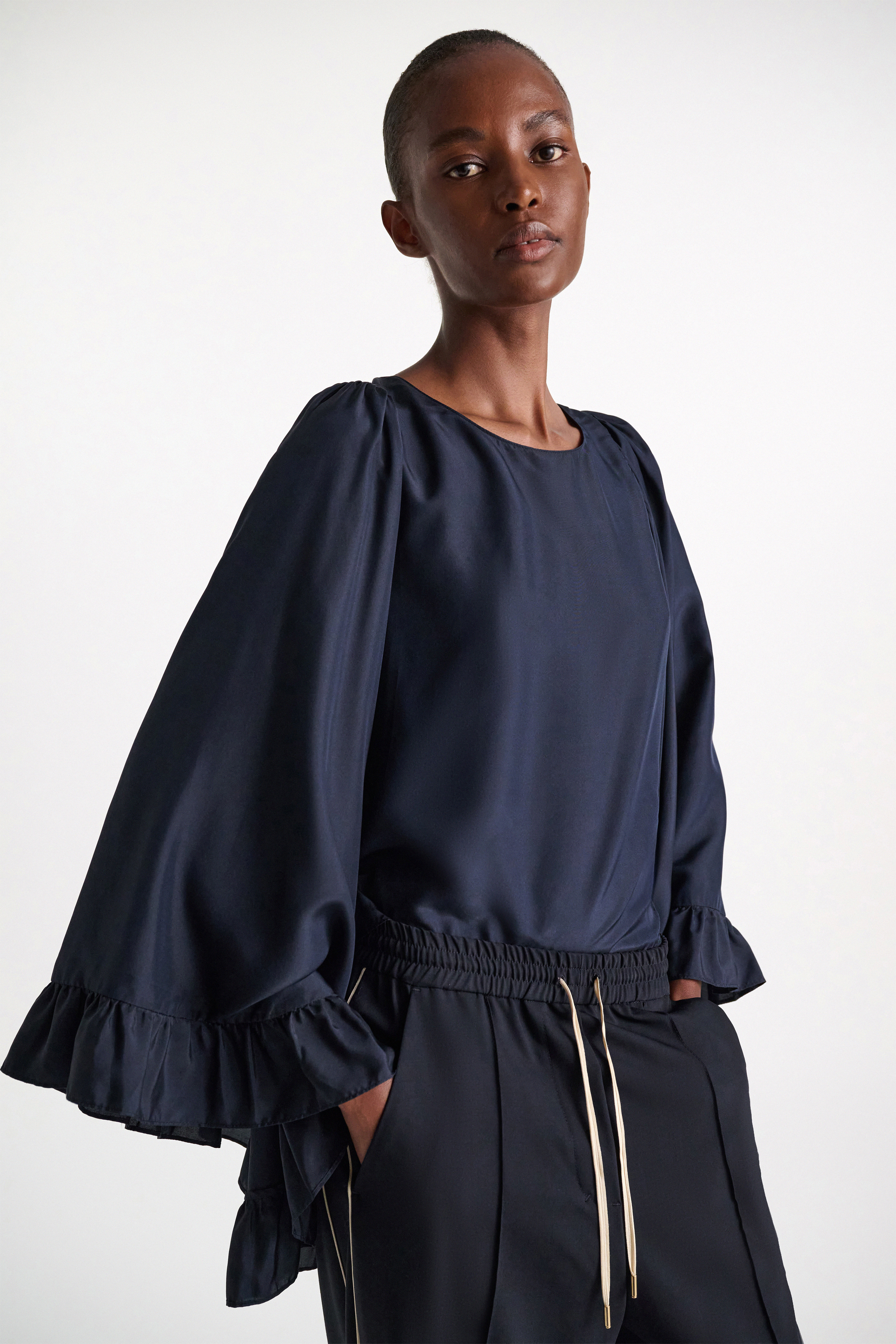 Dorothee Schumacher T-shirt style blouse in Habotai silk dark navy